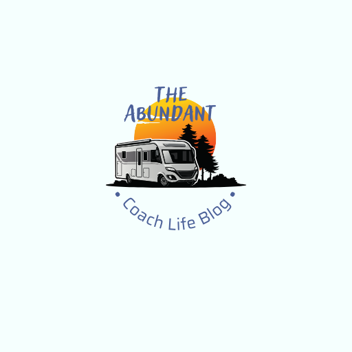 image of a motor coach, sunset and pine trees with The Abundant Coach Life Blog written
